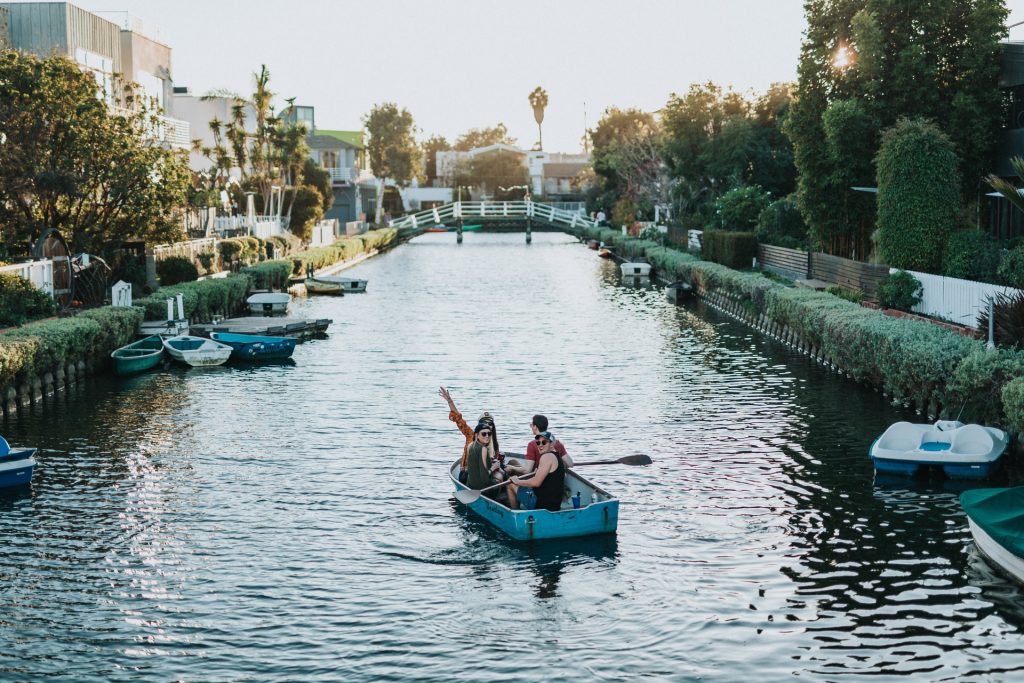 guys on boats bros being boys on venice canal los angeles moat