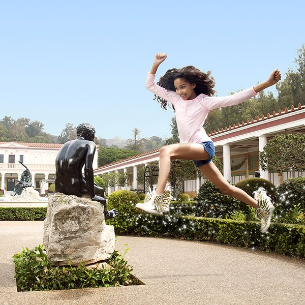 girl jumping with wing shoes randomly getty villa