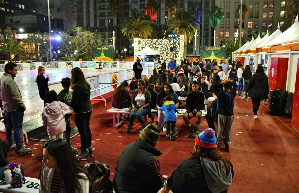 pershing square dtla ice skating sitting