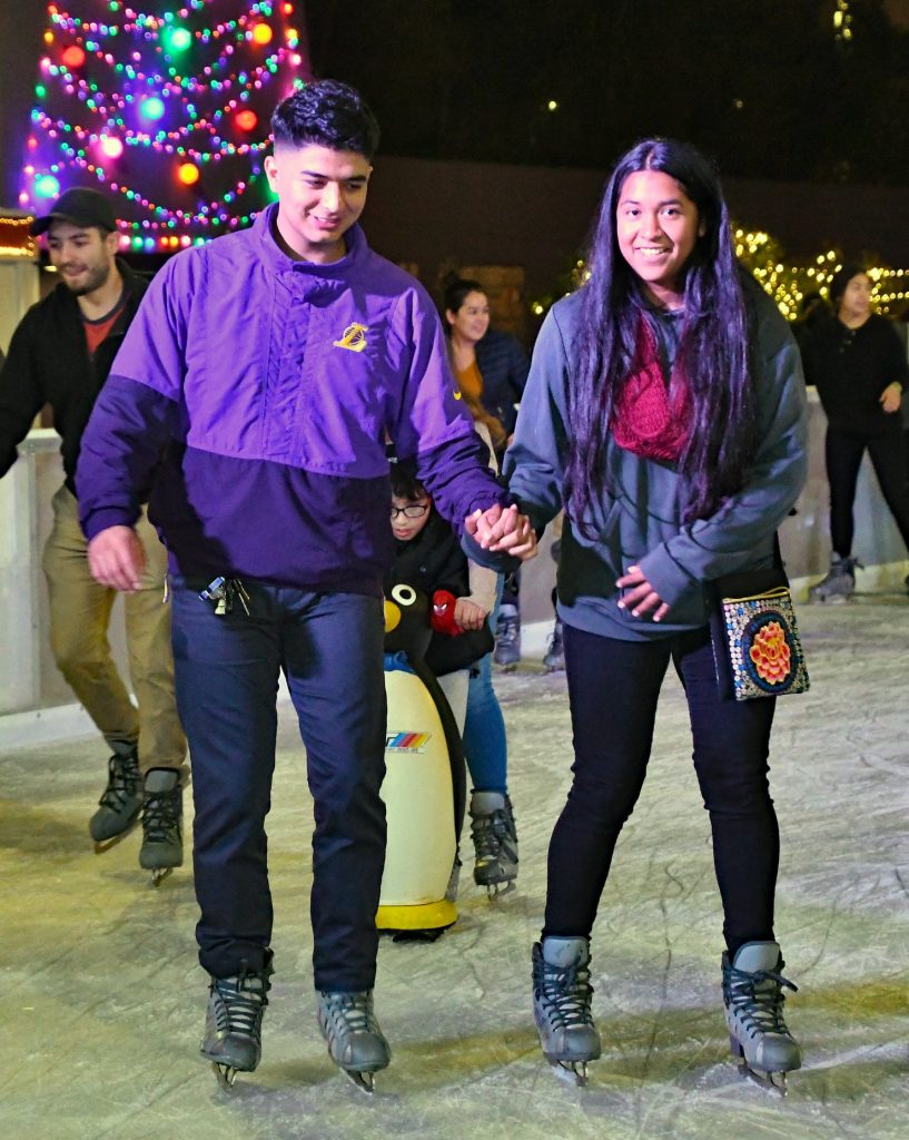 pershing square dtla ice skating holding hands